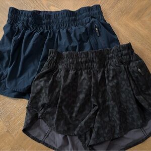 (2) pairs of Lululemon shorts size 10, black and navy